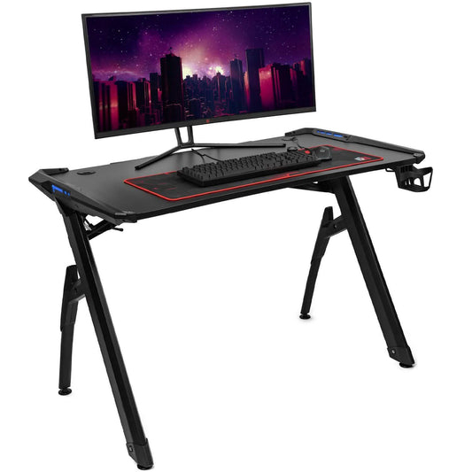 Deco Gear 47 LED gaming desk with monitor, keyboard tray, and red trim
