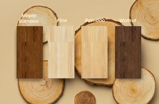 Assorted wooden USB flash drives in walnut, bamboo, maple, and pine finishes