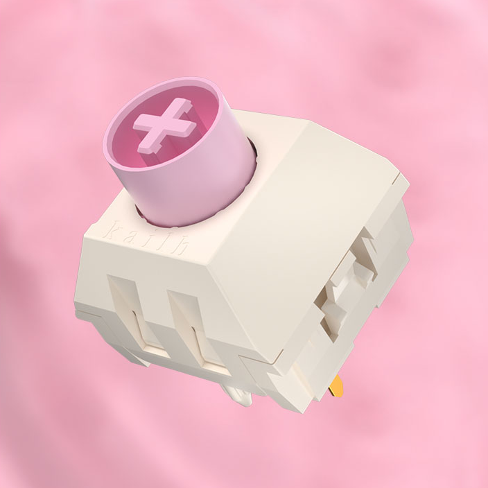Kailh box mechanical switch, pale housing and pink stem, side view with clips