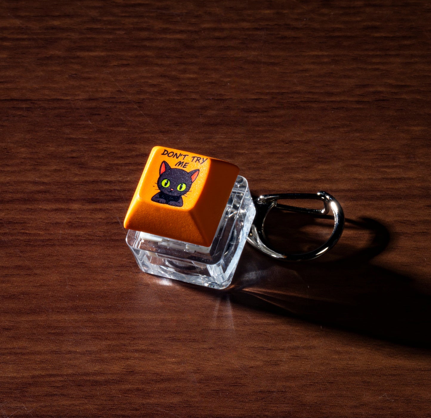Funny keycap fidget keychain with orange “DON’T TRY ME” cat keycap and metal keyring