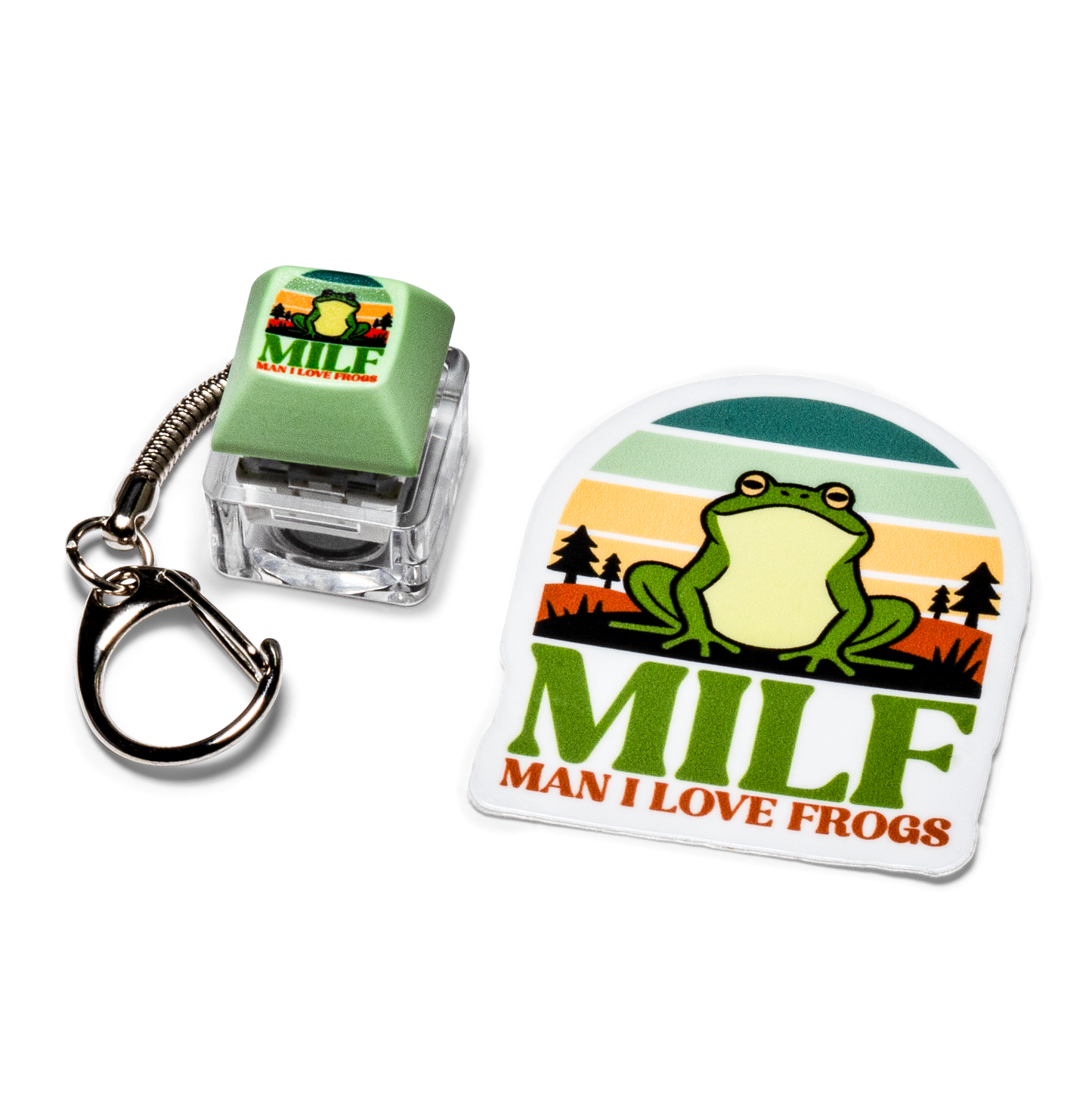 Green keycap fidget keychain with frog graphic and white "Man I love frogs" sticker.