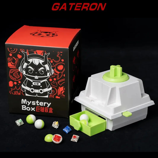 Gateron mystery box with white switch housing and lime green stem, plus loose switches