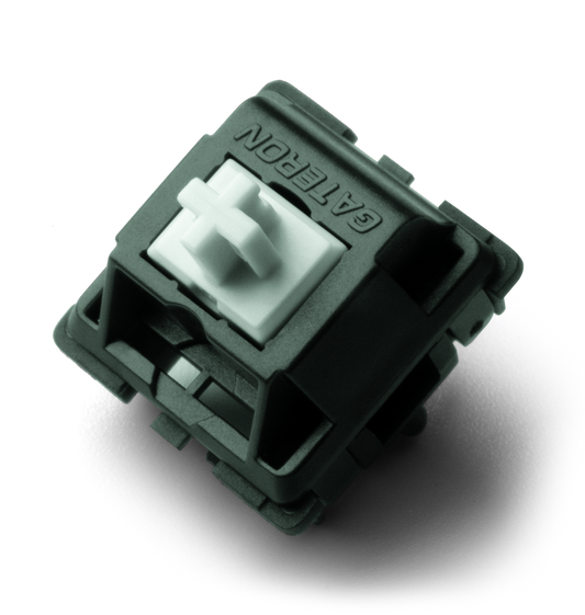 Silent linear keyboard switch with dark green housing and white stem