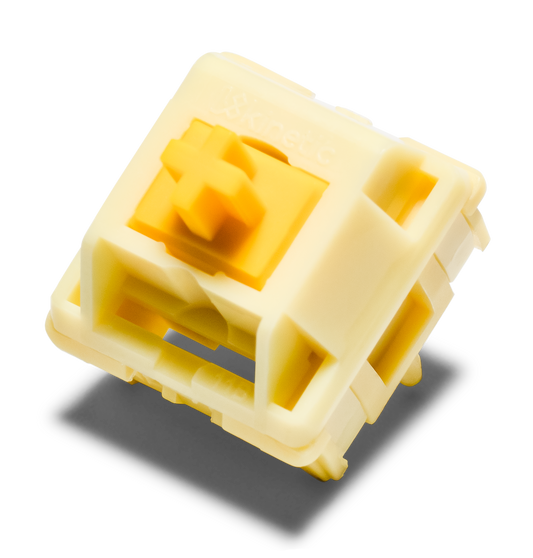 HMX Butter linear switch with yellow stem in cream housing
