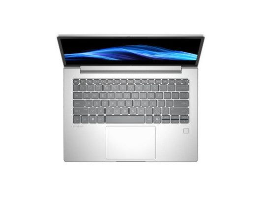 Silver laptop front view with keyboard and touchpad