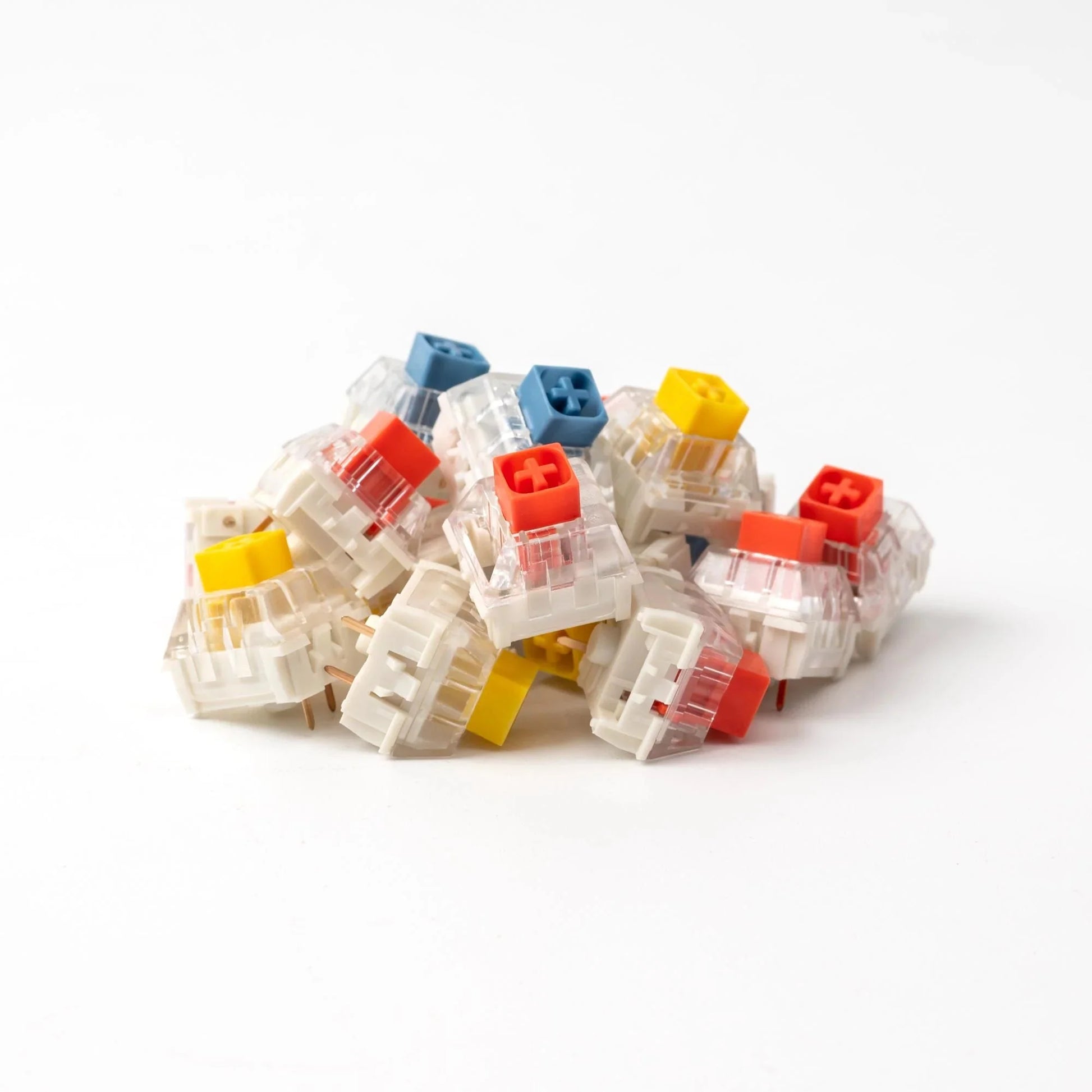 Box heavy switches assortment with clear housings and colored tops and stems