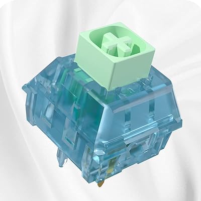 Translucent light-blue clicky mechanical switch with mint-green stem