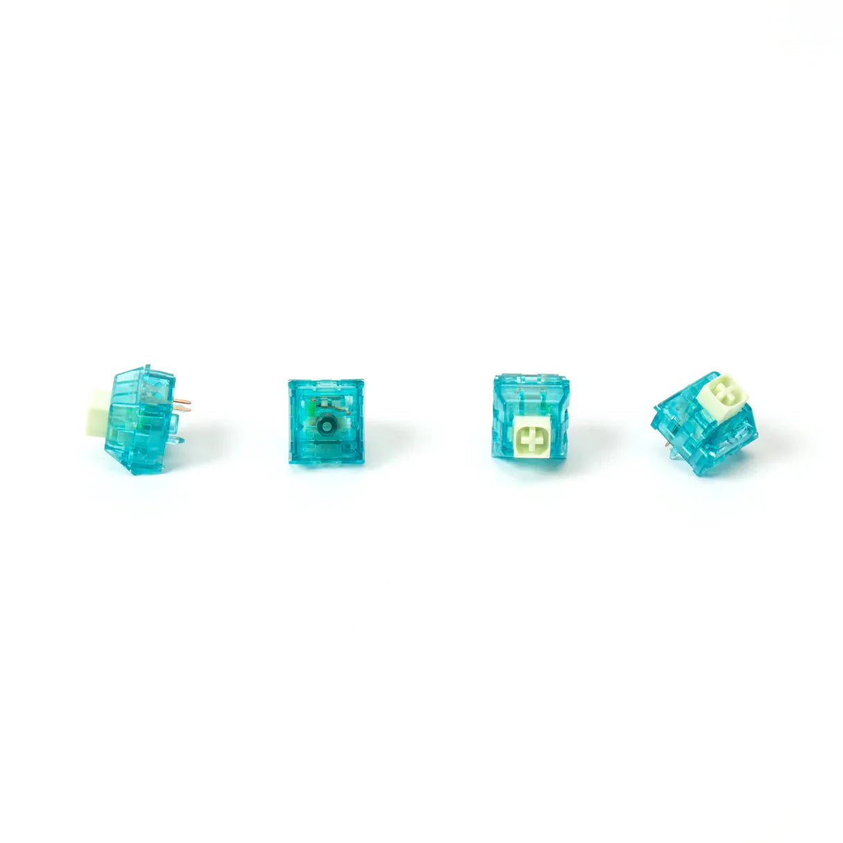 Set of four translucent teal clicky mechanical switches with varied stem sides