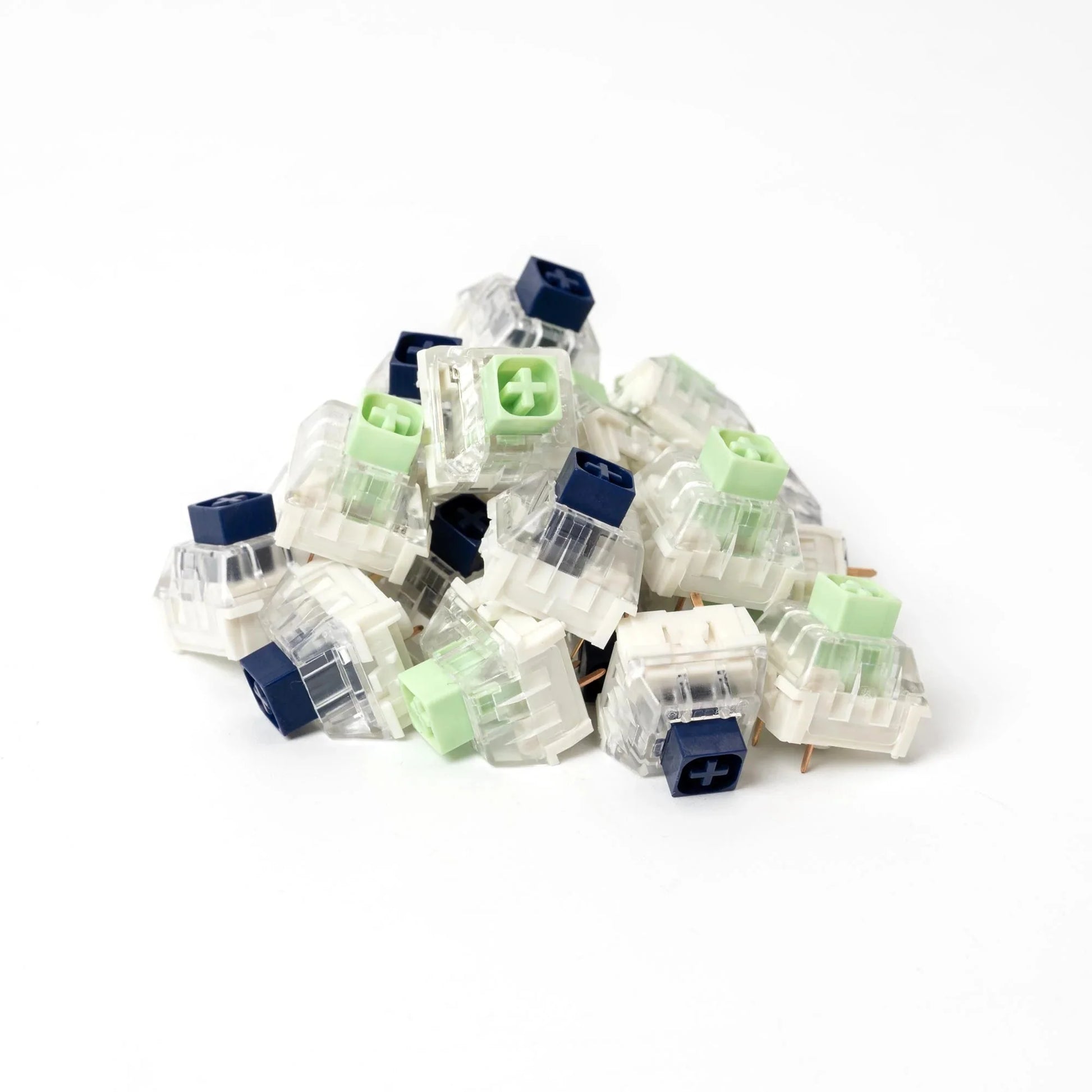 Assorted clicky switches with jade-green and navy-blue keycaps in clear housings