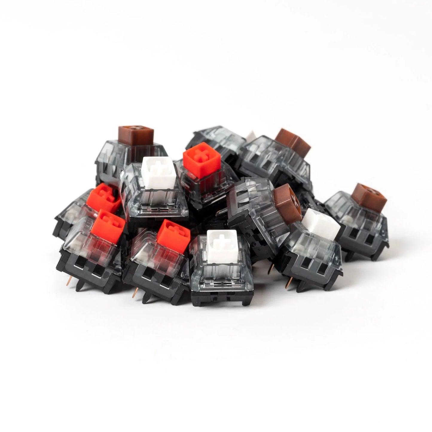 Box V2 switches assortment with red, white, and brown keycaps in clear housings