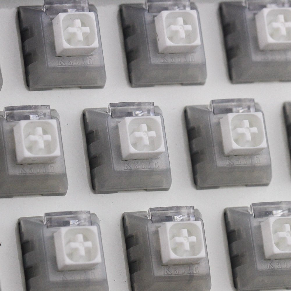 White owl box switch array with translucent tops and Kailh cross logo on key stems