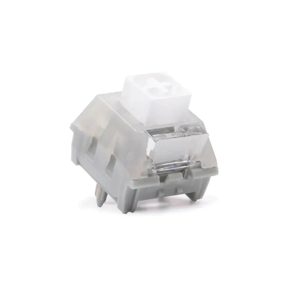 White mechanical switch with translucent housing and cross stem, side angle with pins visible