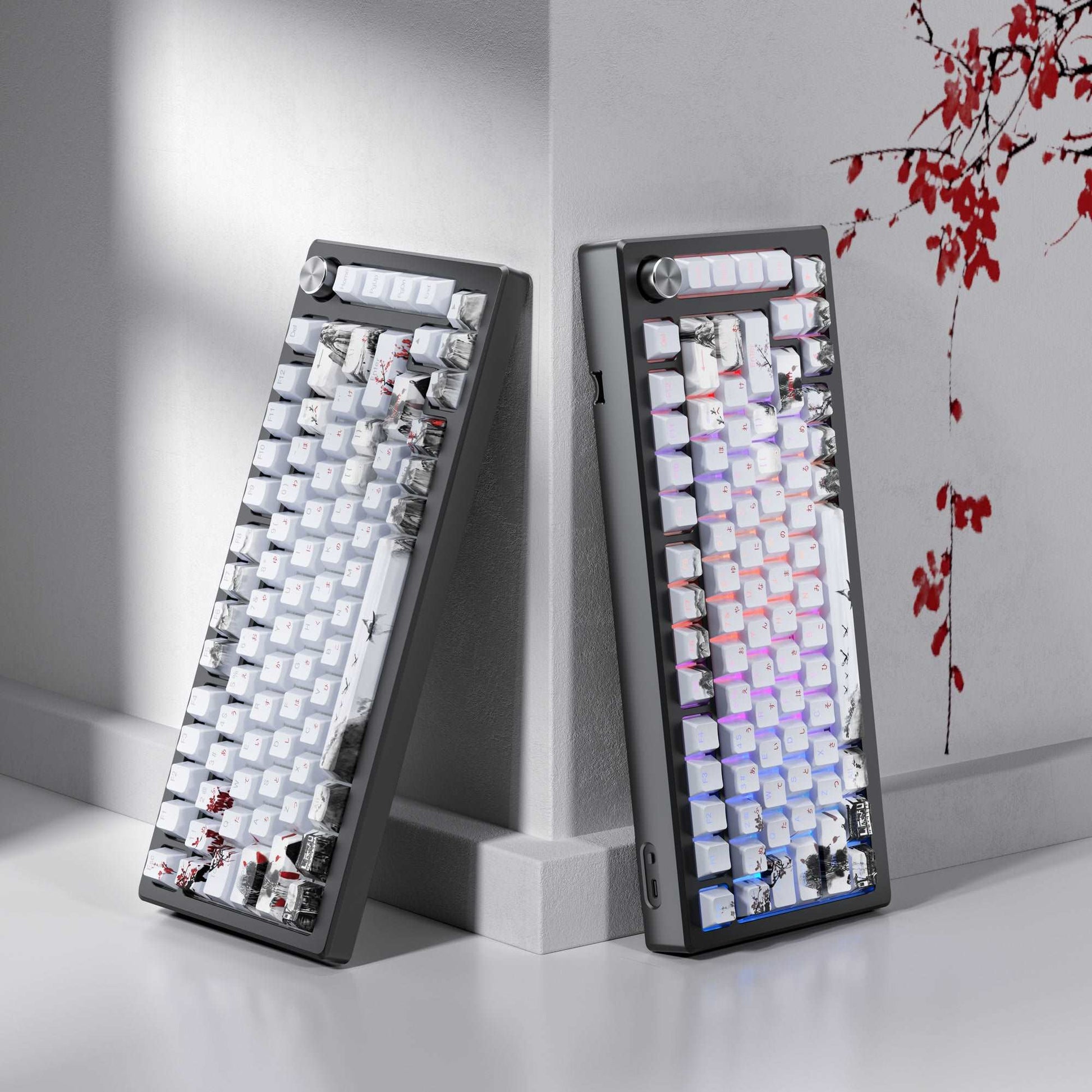 Open boxes of white cherry-profile keycaps with cherry blossom and cityscape prints