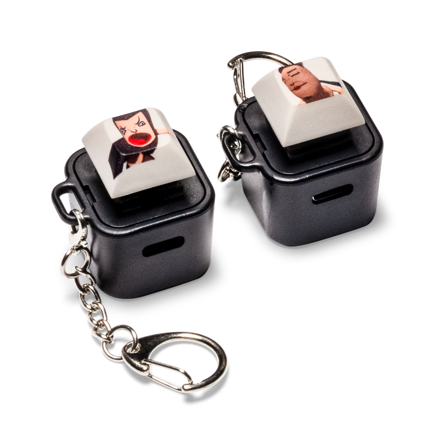 Black keycap animation fidget with face graphic, attached to metal keychain