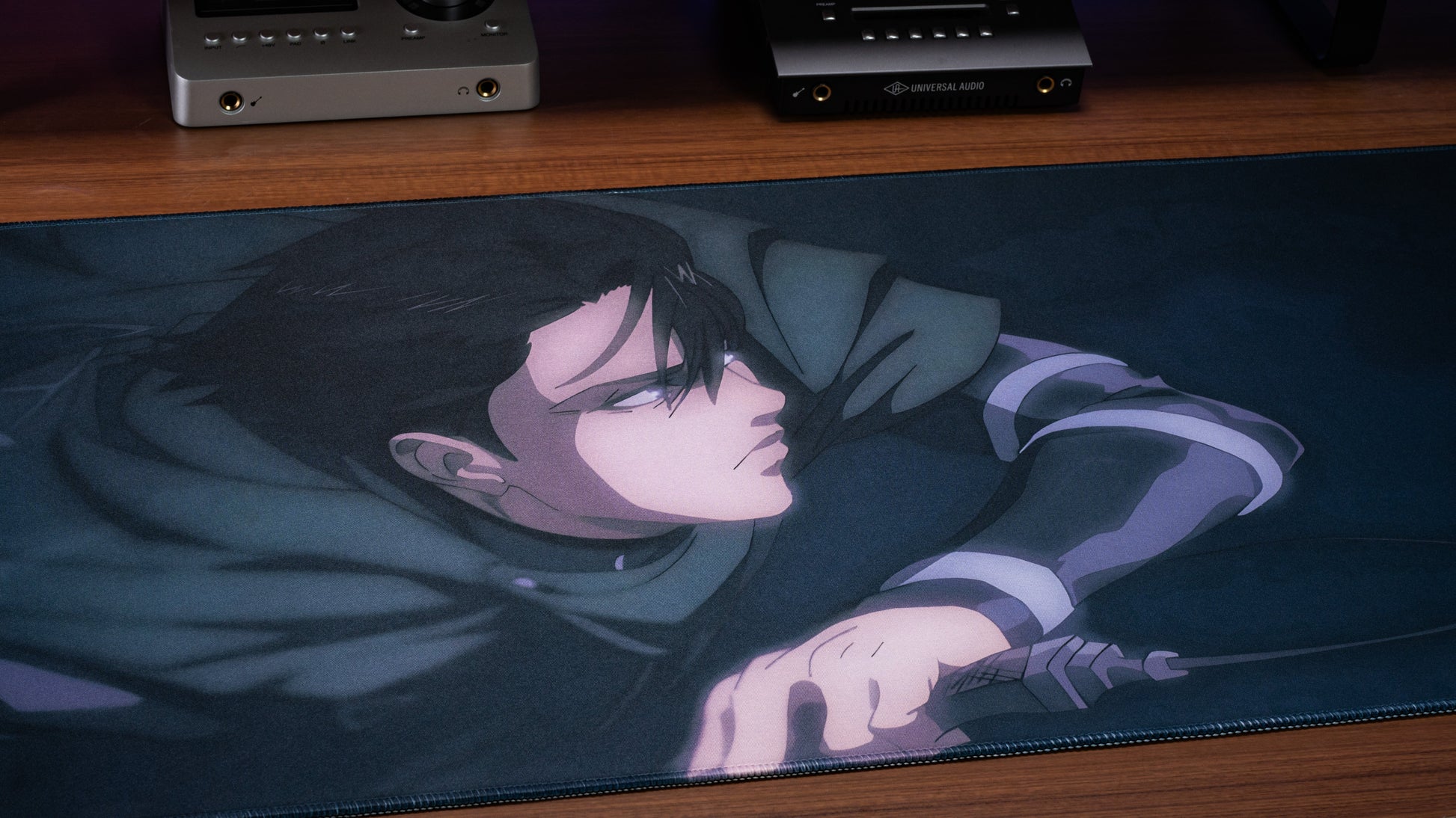 Anime desk mat with character pair resting, dark blue illustration