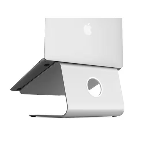 White laptop stand with angular base holding a laptop, front view