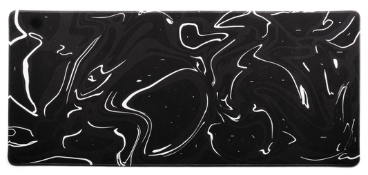 Black desk mat with white marble swirl pattern and thin stitched border