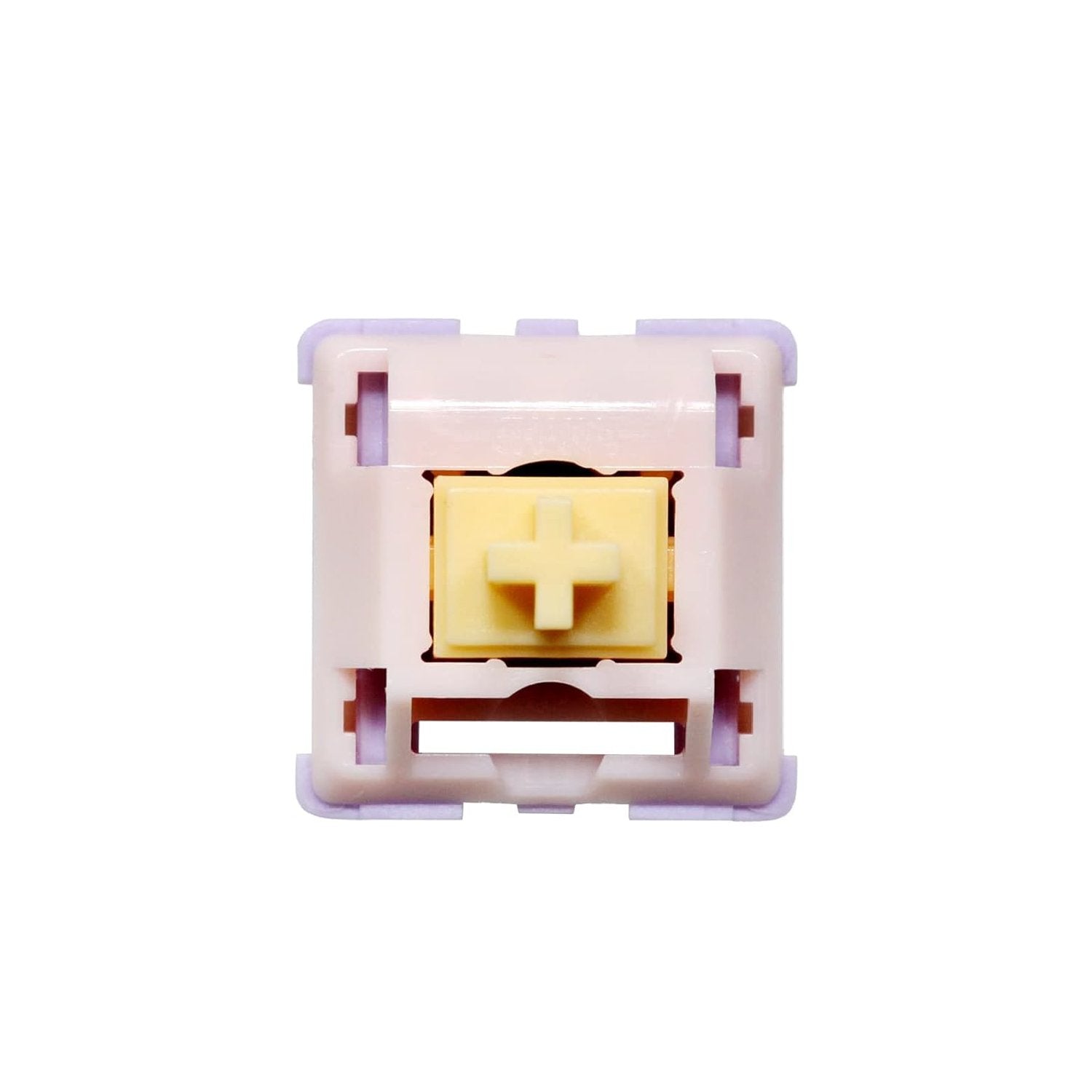 Keyboard switch interior view with pale frame and yellow cross stem