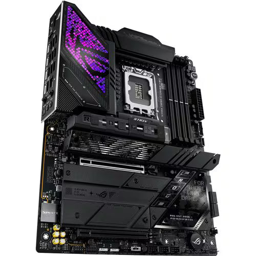 Gaming motherboard close view with purple LED strip, CPU socket, and chipset heatsinks