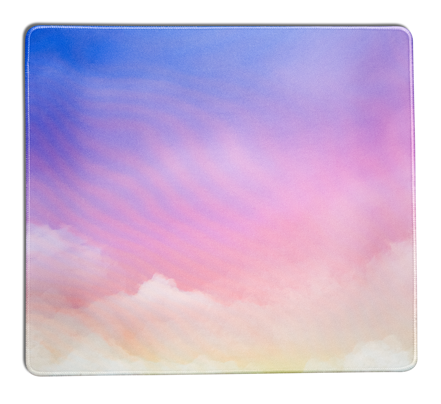 Square desk mat with pastel sky gradient, blue to pink clouds, and rounded stitched corners