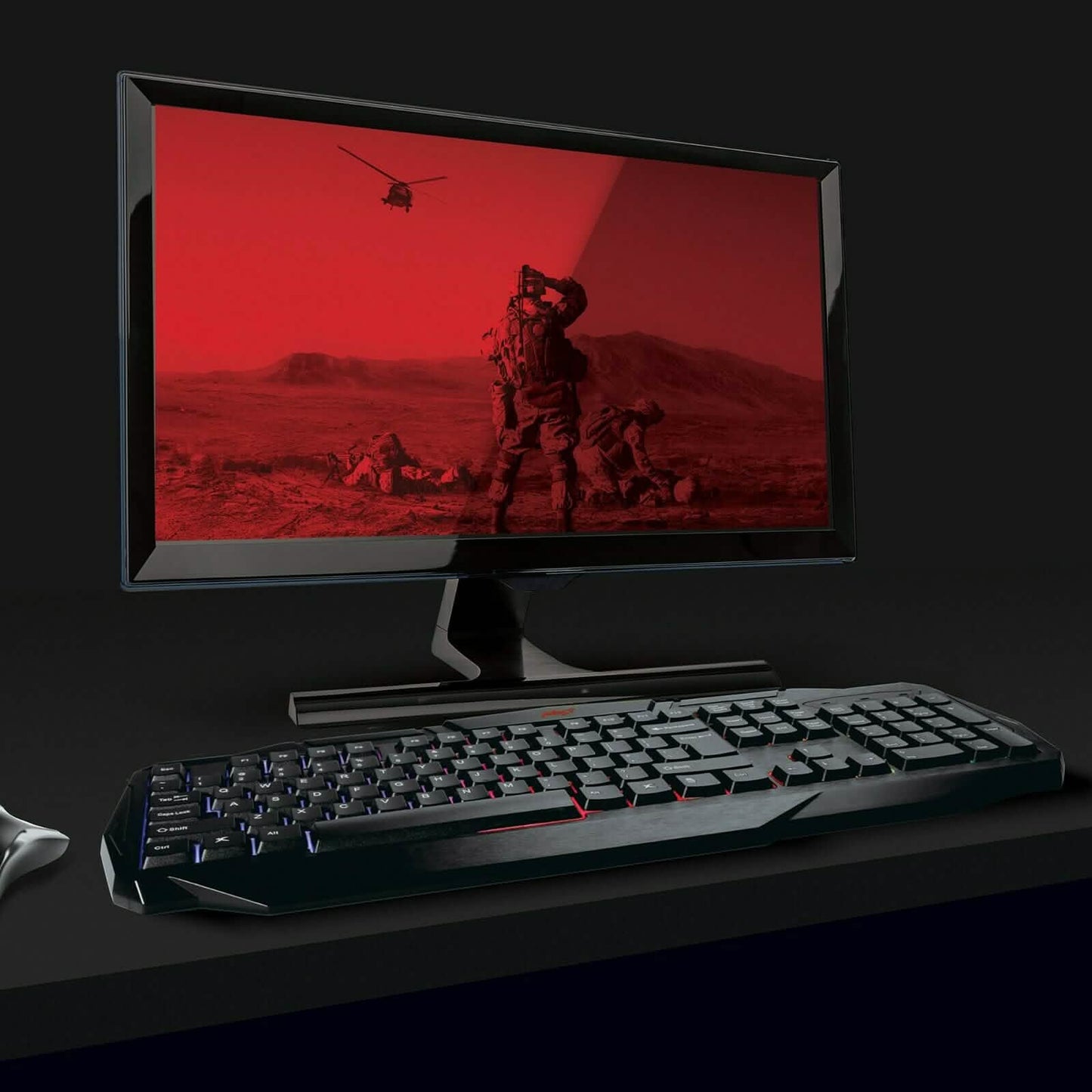 RGB backlit gaming keyboard in black with full-size keys under dark lighting.