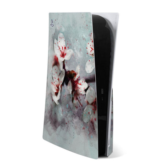 PS5 skin with cherry blossom flowers in white and red on light blue-gray background