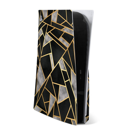 PS5 console skin with black base and gold geometric lines