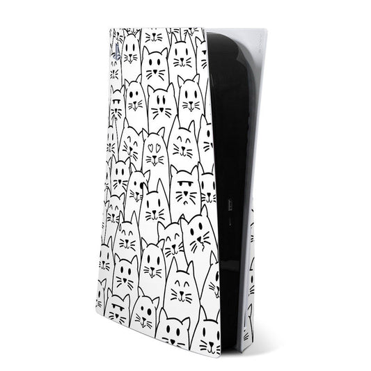 Cat-themed PS5 skin with white and black cartoon cats pattern