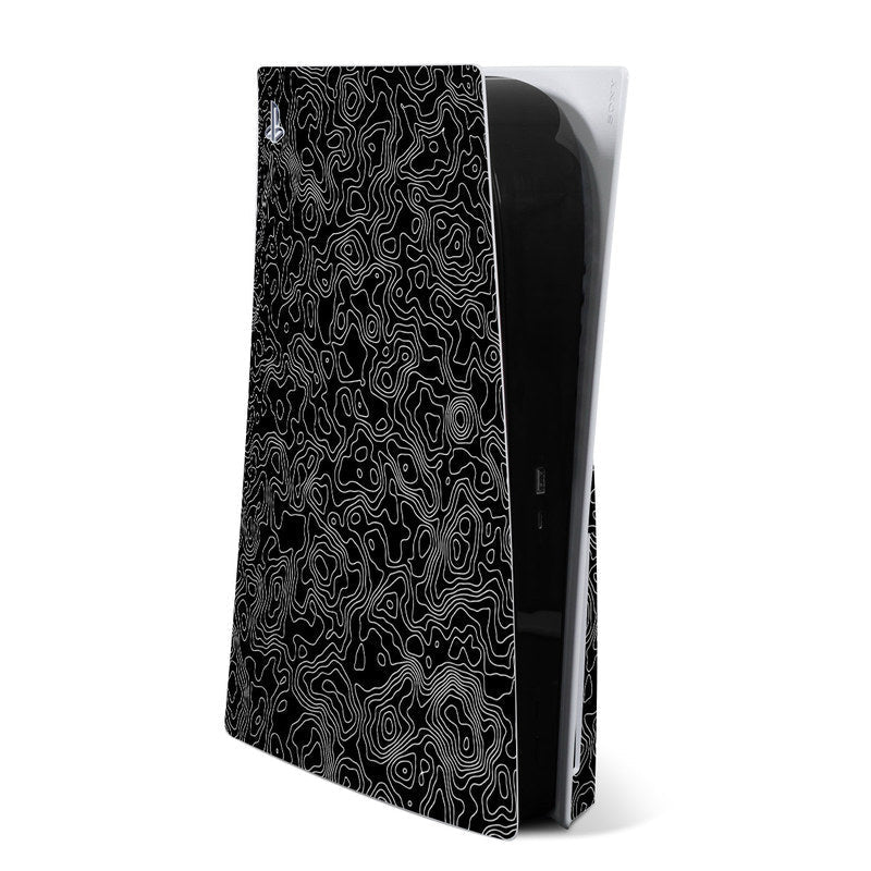 PS5 skin with black base and white topographic-style contour lines