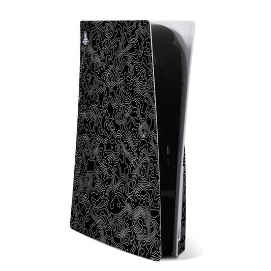 PS5 skin with black base and white topographic-style contour lines