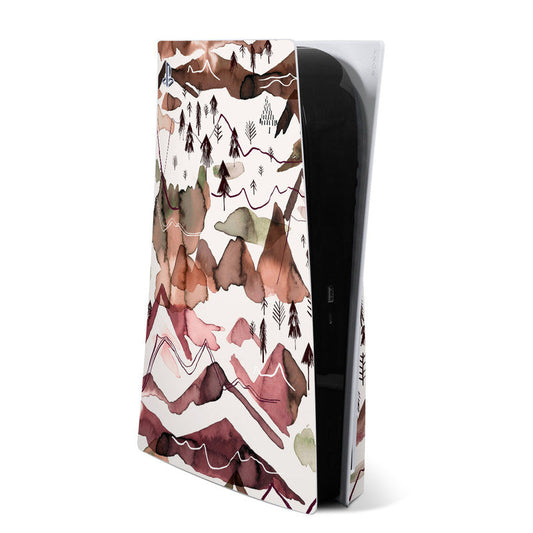 PlayStation 5 console skin with watercolor mountain and pine tree pattern