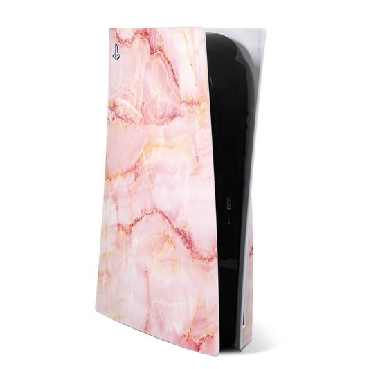 Pink marble PS5 skin with black console side visible