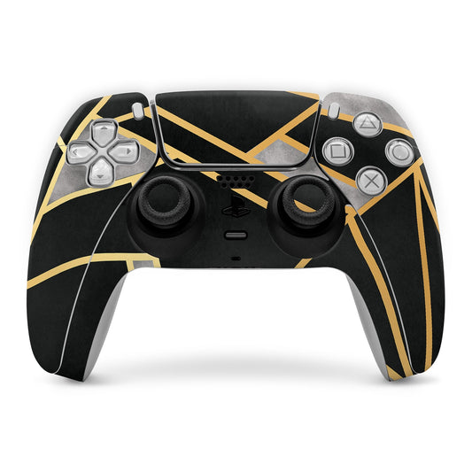 PS5 controller skin in black with gold geometric lines over buttons and touchpad