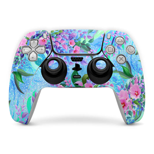 Sony PS5 controller skin with lavender and pink floral pattern, blue background.