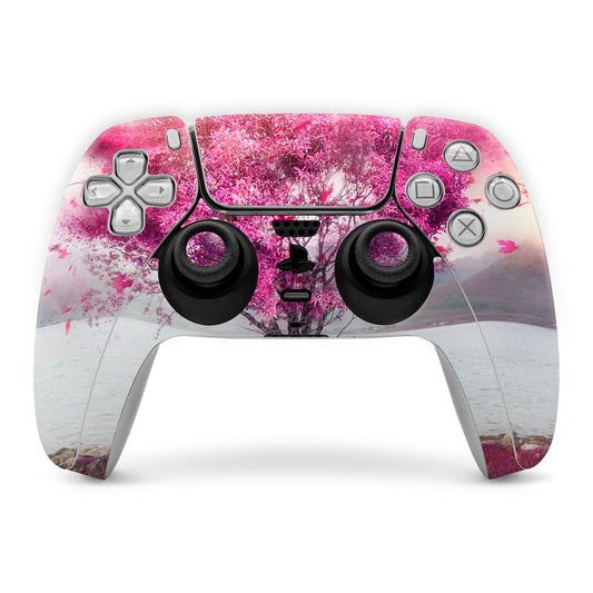 PlayStation 5 controller skin with pink tree blossom and cherry foliage pattern