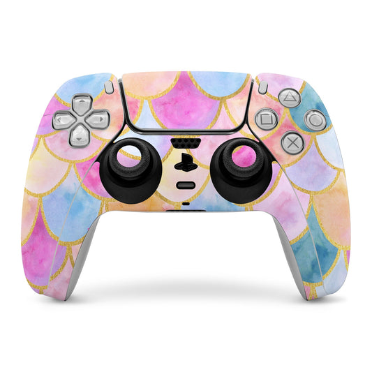 PS5 controller skin with pastel mermaid scale design in pink, blue, and gold accents