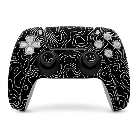 Black PS5 controller skin with white contour line pattern around touchpad and buttons