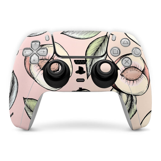 Peach-pink PS5 controller skin with feather and eye graphics; cutouts for buttons and sticks