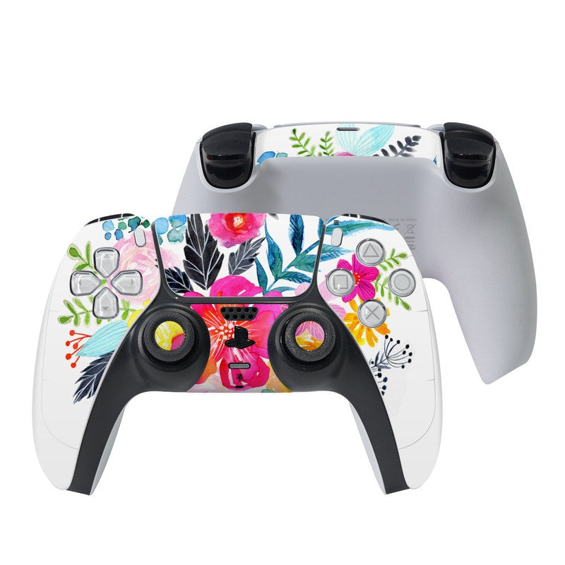 Pink floral Sony PS5 controller skin wrap with button cutouts and thumb grips