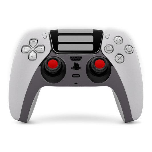 PS5 controller skin with black retro panel, red analog caps, and gray button layout