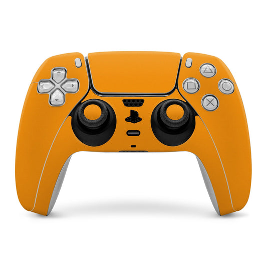 Orange PlayStation 5 controller skin covering front buttons and thumbsticks