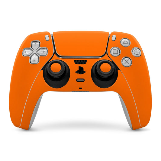 Orange PS5 controller skin with black thumb grips and silver button accents