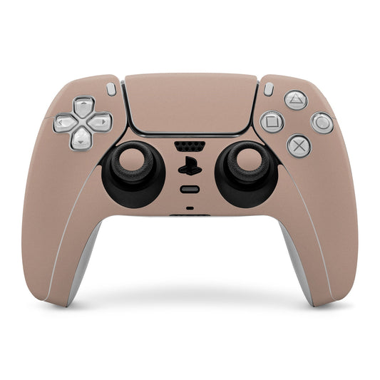 Pink PS5 controller skin wrap with cutouts for buttons and thumbsticks