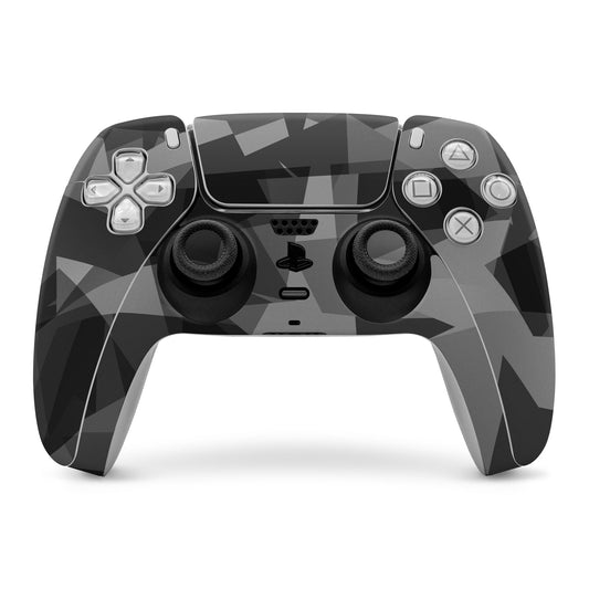 PS5 controller skin with dark gray and black geometric pattern and cutouts
