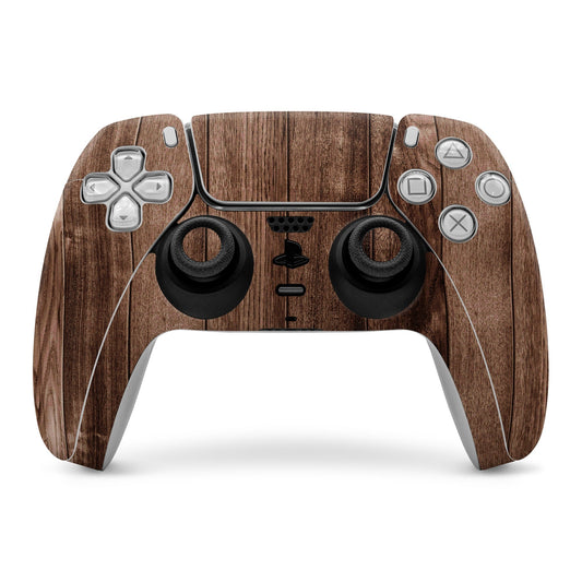 Stained wood Sony PS5 controller skin with wood-grain pattern over buttons