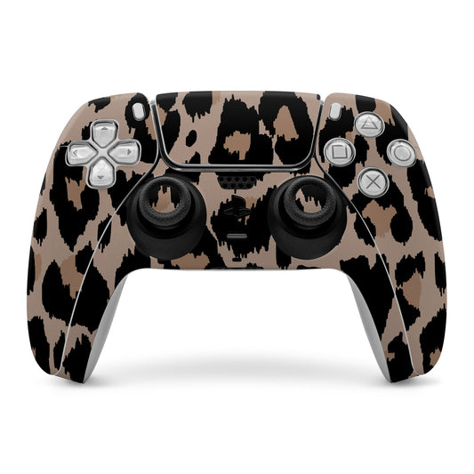 Sony PS5 controller skin with beige and black camo pattern over face buttons