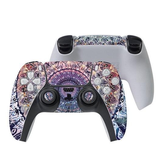 Sony PS5 controller skin with colorful graffiti pattern over face buttons and touchpad