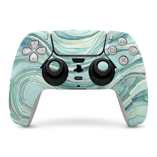 Turquoise wave-pattern PS5 controller skin with cutouts for buttons and thumbsticks