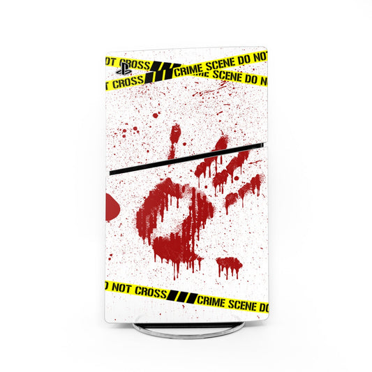 PS5 Slim console skin with red blood splatter, yellow warning tape, and black stripe