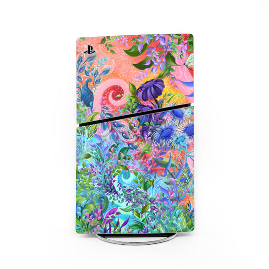 PlayStation 5 Slim skin with vibrant fantasy garden artwork, colorful plants and butterflies.